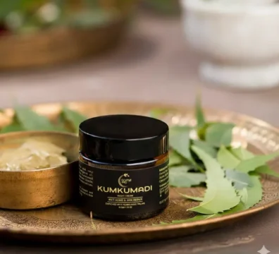 Divine Era Herbal Kumkumadi Cream jar with saffron, sandalwood, and rose petals — best Kumkumadi cream for skin whitening in India, helps reduce pigmentation, dark circles, and wrinkles naturally.